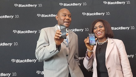 (L-r) Mr. Charles Asinugo, country director, Ugonna Akhigbe, channel marketing manager, both of BlackBerry West Africa, excited about the launch of BlackBerry Z3 in Lagos, Nigeria ...on Thursday.